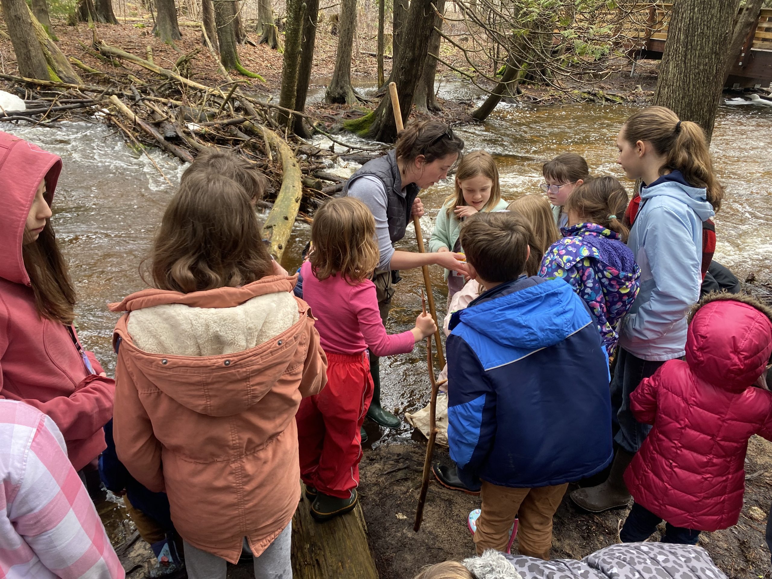 Executive Director Sam Koyen sharing sucker education with home school children, during Spring Explorers.